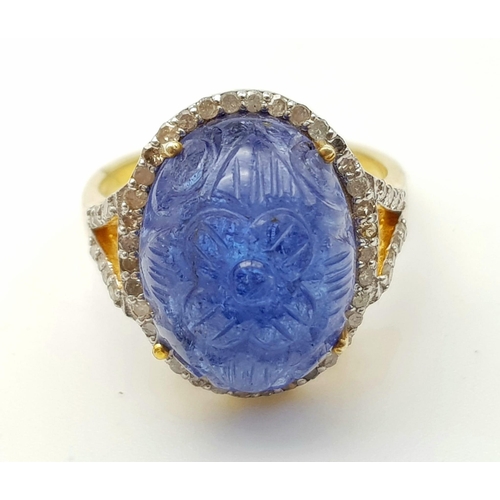 96 - 18ct Natural Carved Tanzanite Gemstone Ring with .53ct Of Diamonds in a Halo Setting. 925 Silver. Si... 