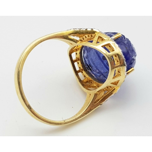 96 - 18ct Natural Carved Tanzanite Gemstone Ring with .53ct Of Diamonds in a Halo Setting. 925 Silver. Si... 