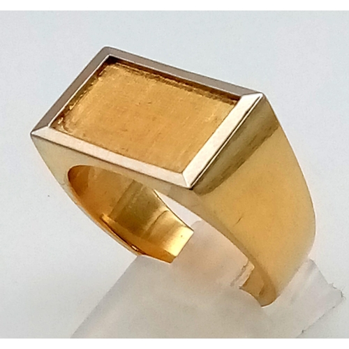 135 - A Swiss 18K Two-Colour Gold Signet Ring. Size U. 18.62g total weight.