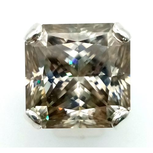 30 - A Rare 79.4ct Brandy Shade Moissanite Ring set in 925 Silver. Size S. 31g total weight.