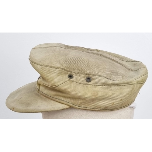 69 - WW2 German Africa Corps M41 Cap Worn by a Captured P.O.W. with Eagle Removed.