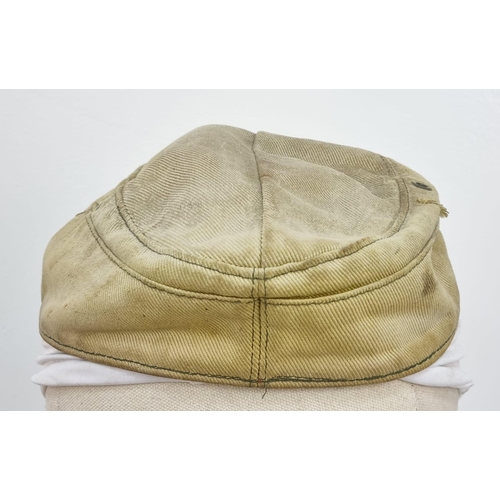 69 - WW2 German Africa Corps M41 Cap Worn by a Captured P.O.W. with Eagle Removed.