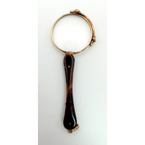 225 - A Victorian pair of 15 carat yellow gold lorgnette spectacles made in France. They have a tortoise s... 