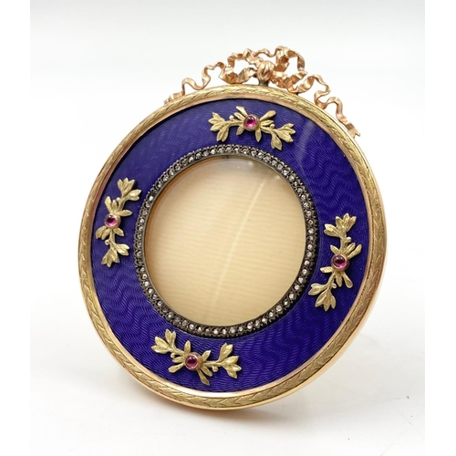 1267 - A Russian 14K Yellow Gold Diamond and Enamel Gemset Picture Frame. 7.5cm diameter.
102g total weight... 