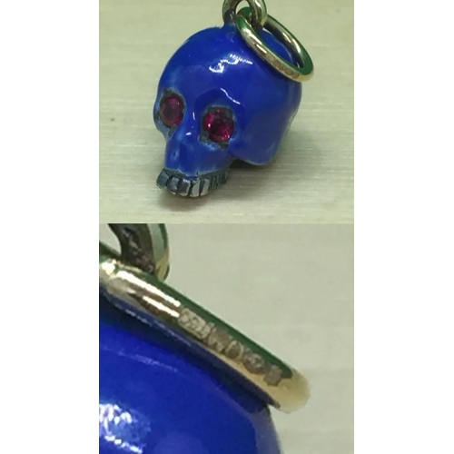 500 - Magnificent 18k gold and silver enamel skull pendent 

SIZE

LENGTH. ::: 2.3 cm from larger loop to ... 