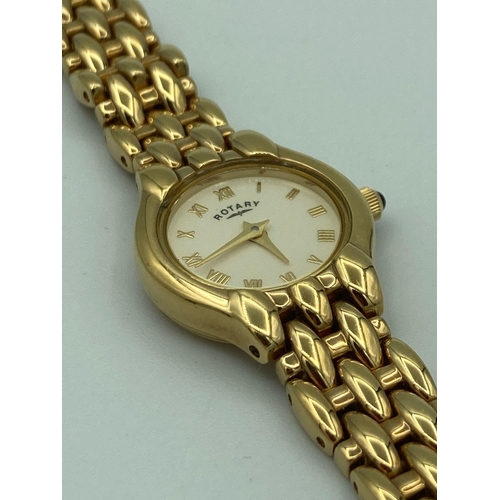 127 - Ladies Gold Plated ROTARY Wristwatch ,having cream face with Roman numerals and  blue cabochon set w... 