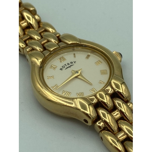 127 - Ladies Gold Plated ROTARY Wristwatch ,having cream face with Roman numerals and  blue cabochon set w... 