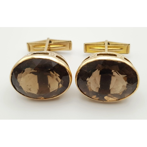 176 - An Edwardian Possibly Victorian Pair of 9K Yellow Gold Smokey Quartz Cufflinks. Two large, well face... 