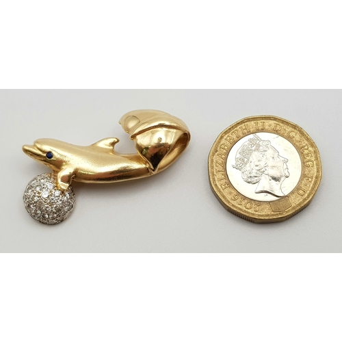 200 - A High Karat Gold (tested) Dolphin - With a Cluster of Diamonds and Sapphire Eye Pendant. 35mm. 7.68... 