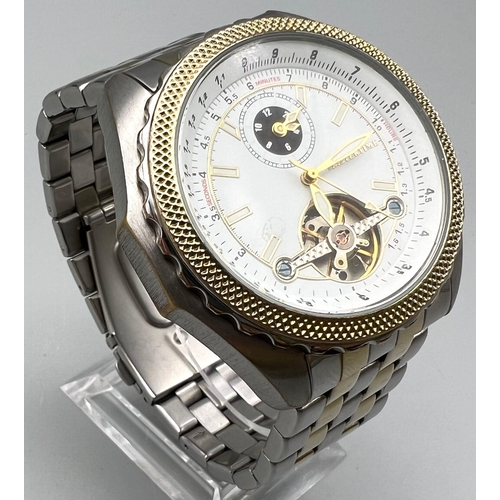 240 - A Mastertime Automatic Skeleton Gents Watch. Two tone strap and case - 42mm. White dial with skeleto... 