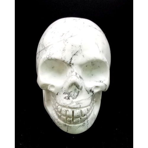 727 - A Hand-Carved  White Howlite Quartz Skull Figure. 5 x 4.5cm