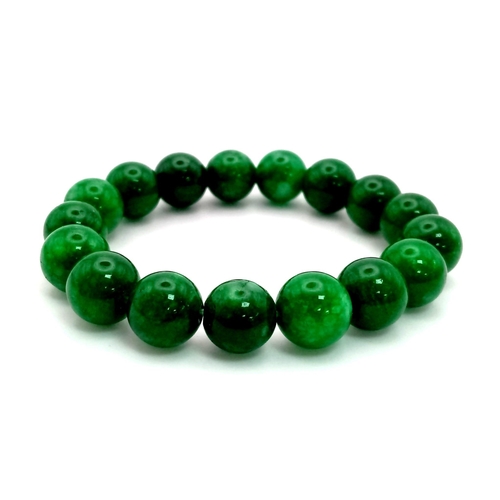 734 - A Green Jade Bead Expandable Bracelet. 12mm beads