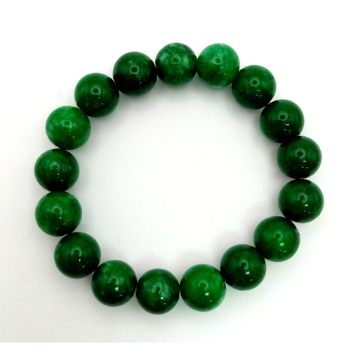 734 - A Green Jade Bead Expandable Bracelet. 12mm beads