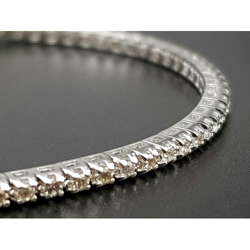 172 - A simple 1.50 carat diamond line bracelet. Classic in design and stunningly made. Set in 18 carat wh... 