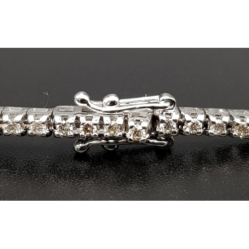 172 - A simple 1.50 carat diamond line bracelet. Classic in design and stunningly made. Set in 18 carat wh... 