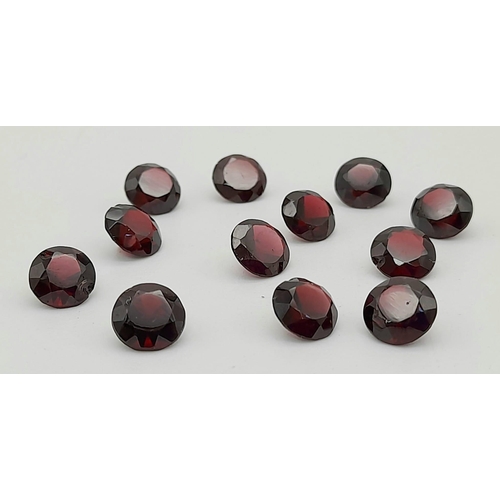 491 - 12 x round shape natural almandine garnets. Each garnet is 7 mm. 21.38 carat total weight. Each weig... 