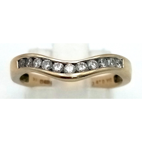 241 - 18K WHITE GOLD DIAMOND SET CURVED BAND RING WITH APPROX 0.20CT DIAMOND, WEIGHT 2.4G SIZE M