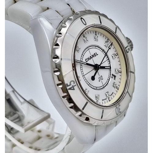 57 - A Chanel J12 Quartz Ladies Watch. White ceramic strap and case - 33mm. White dial with diamond marke... 