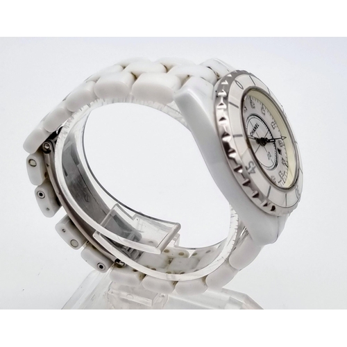 57 - A Chanel J12 Quartz Ladies Watch. White ceramic strap and case - 33mm. White dial with diamond marke... 