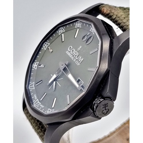 18 - A Corum Admiral's Cup Gents Watch. Green fabric strap. Black steel case - 42mm. Green dial with sub ... 