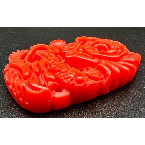 1265 - A Red Jade Dragon Pendant. 6cm