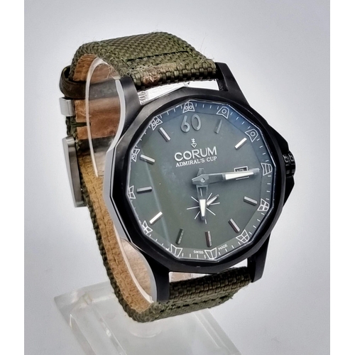 18 - A Corum Admiral's Cup Gents Watch. Green fabric strap. Black steel case - 42mm. Green dial with sub ... 