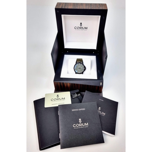 18 - A Corum Admiral's Cup Gents Watch. Green fabric strap. Black steel case - 42mm. Green dial with sub ... 