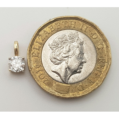 213 - An 18K Yellow Gold Diamond Solitaire Pendant. 0.33ct quality round cut diamond. 0.6g total weight.