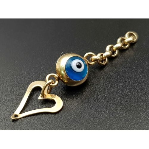 486 - AN EVIL EYE AND HEART DROP PENDANT.  1gm