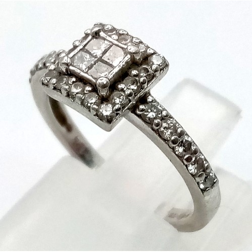 143 - A PLATINUM DIAMOND CLUSTER RING.  4gms 0.50ct  size I