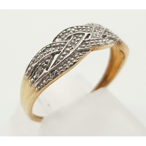 731 - A 9K Yellow Gold Diamond Crossover Band Ring. Size P. 1.6g total weight.