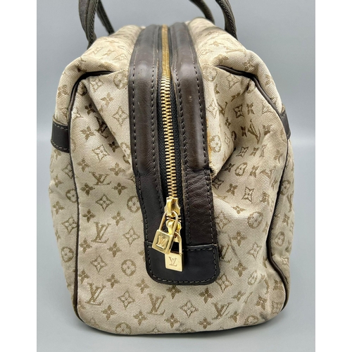 79 - A Louis Vuitton Josephine Handbag. Monogram pale green on cream LV Canvas. Leather and green cloth h... 