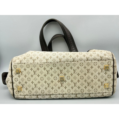 79 - A Louis Vuitton Josephine Handbag. Monogram pale green on cream LV Canvas. Leather and green cloth h... 