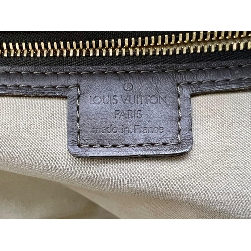 79 - A Louis Vuitton Josephine Handbag. Monogram pale green on cream LV Canvas. Leather and green cloth h... 