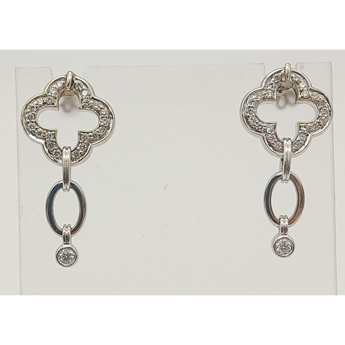 81 - A Pair of 18K White Gold Diamond Good Luck Charm Earrings. 0.5ct. 8.7g total weight