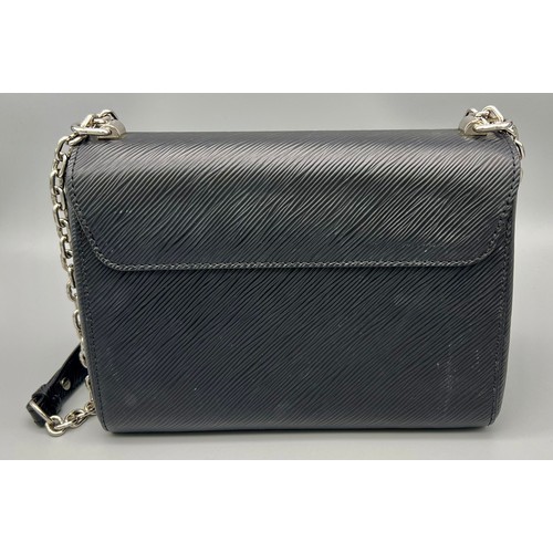 64 - A Very Stylish Louis Vuitton Black Epi Twist Crossbody Bag. Silver tone hardware.  24 x 17cm. Comes ... 