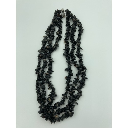 174 - Black rough cut TOURMALINE NECKLACE having three rows and closing with a genuine SILVER CLASP. Quali... 