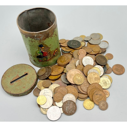 1200 - A vintage money tin full of coins from different parts of the world.