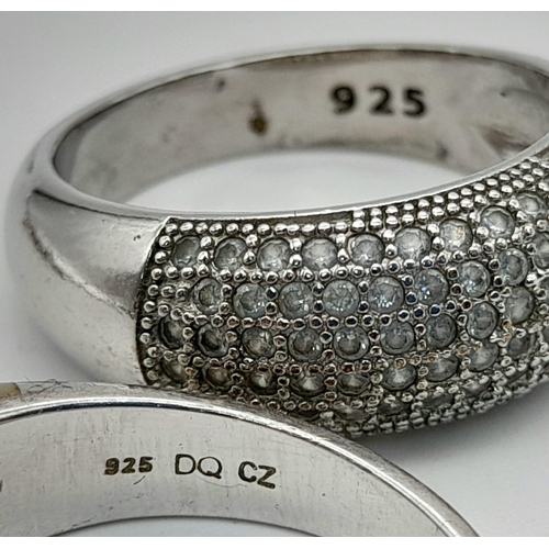 321 - Five sterling solver rings with crystals, Size: S to Y, total weight: 26.7 g.