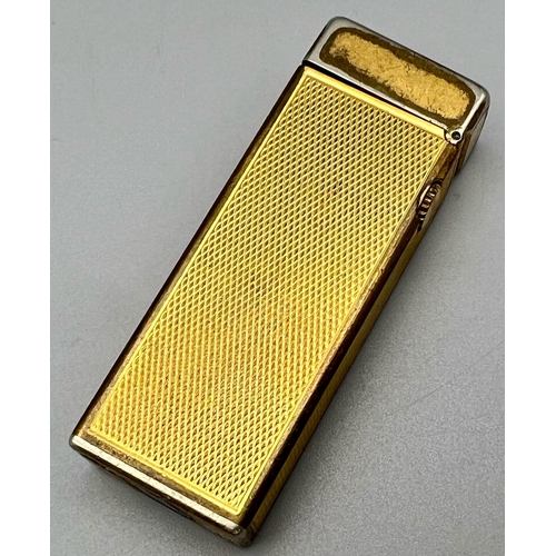 323 - A Vintage Gold Plated Dunhill Lighter. As found