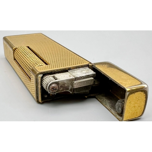 323 - A Vintage Gold Plated Dunhill Lighter. As found