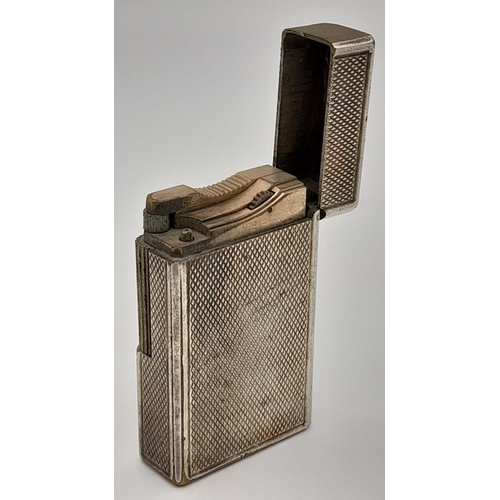 677 - A Vintage Silver Tone Dupont Lighter. A/F