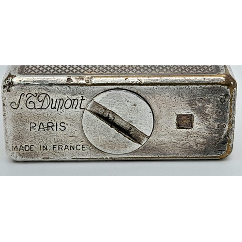 677 - A Vintage Silver Tone Dupont Lighter. A/F