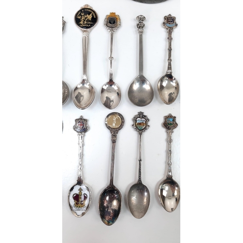 931 - An interesting lot of over 20 collectable silver plated spoons AND an English pewter jug with a glas... 