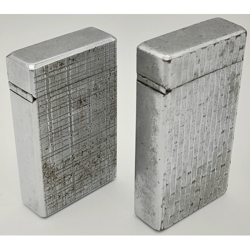 1053 - Two Vintage Silver-Tone Colibri Moletric Lighters. A/F