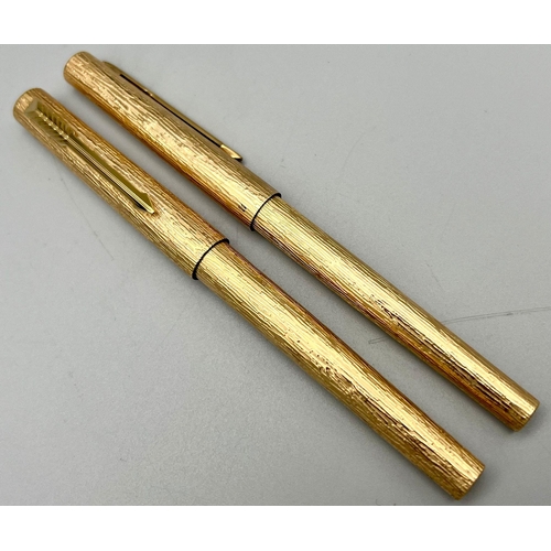 110 - Two Gilded Parker Pens with a Bark Finish. Fountain pen with 14k Gold nib and a ballpoint pen. Comes... 