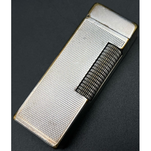 1198 - A Vintage Silver Tone Dunhill Lighter. As found