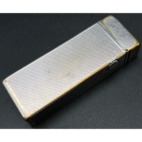 1198 - A Vintage Silver Tone Dunhill Lighter. As found