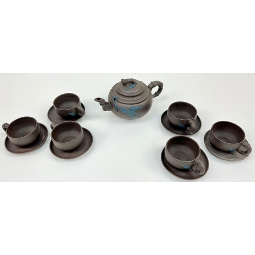 216 - A Mid-20th Century complete tea set of Yixing ware (also known as Zisha). In original presentation b... 