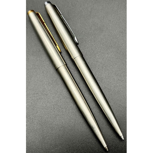 684 - Two Vintage Stainless Steel Parker Ballpoint Pens. In a Parker case. A/F